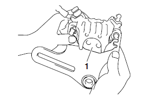 Replacing the rear brake pads