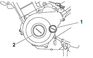 Adjusting the valve clearance
